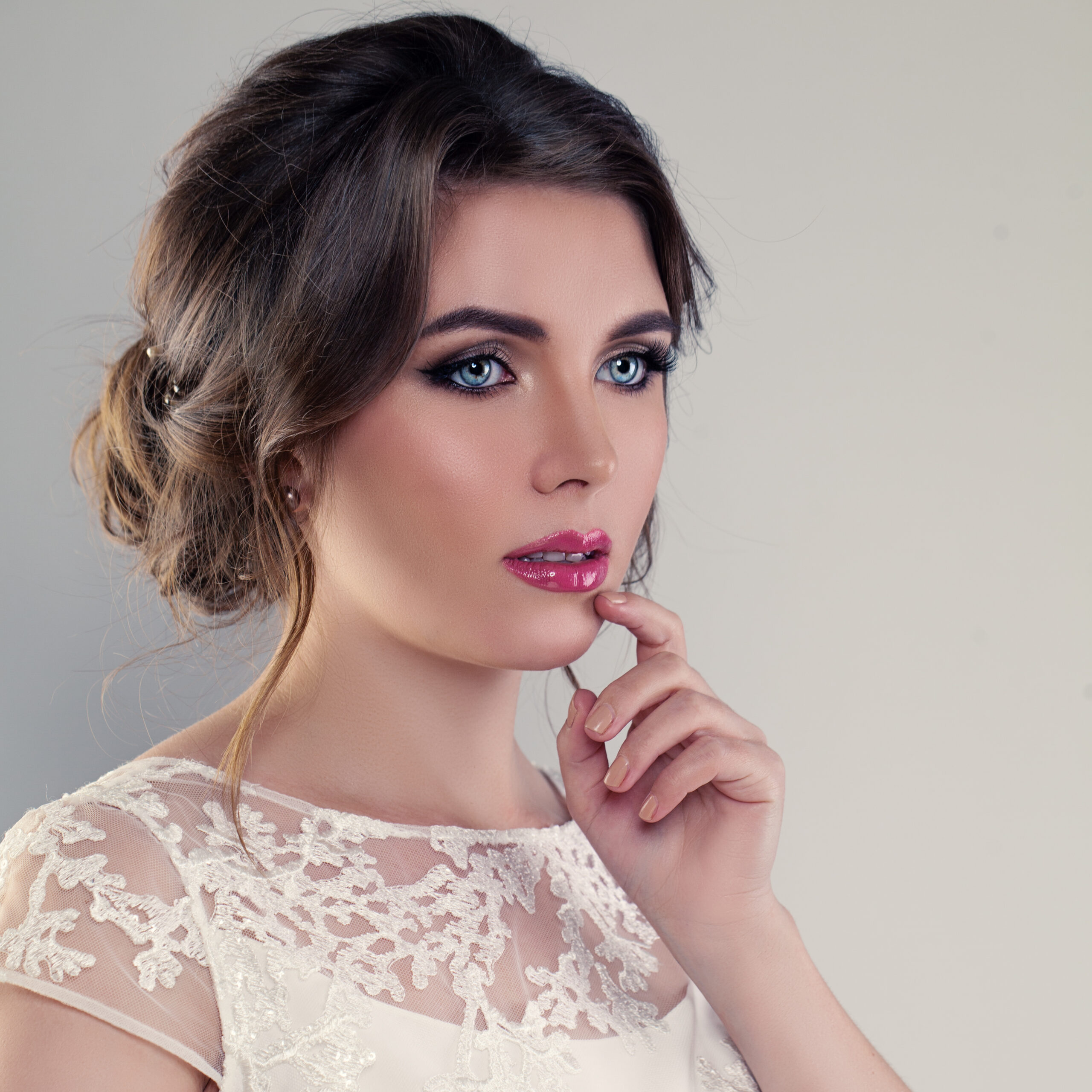 young bride cute woman fiancee with bridal hairstyle makeup scaled